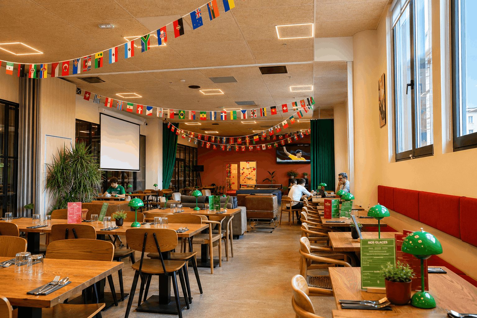 La salle du Café Central, match sur écran géant et drapeaux